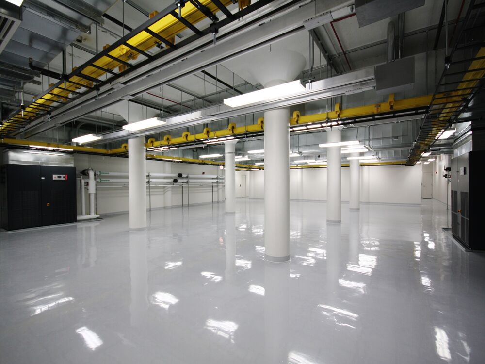 Mission-critical data hall floor with overhead cable tray